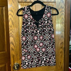 White House Black Market silky like material.